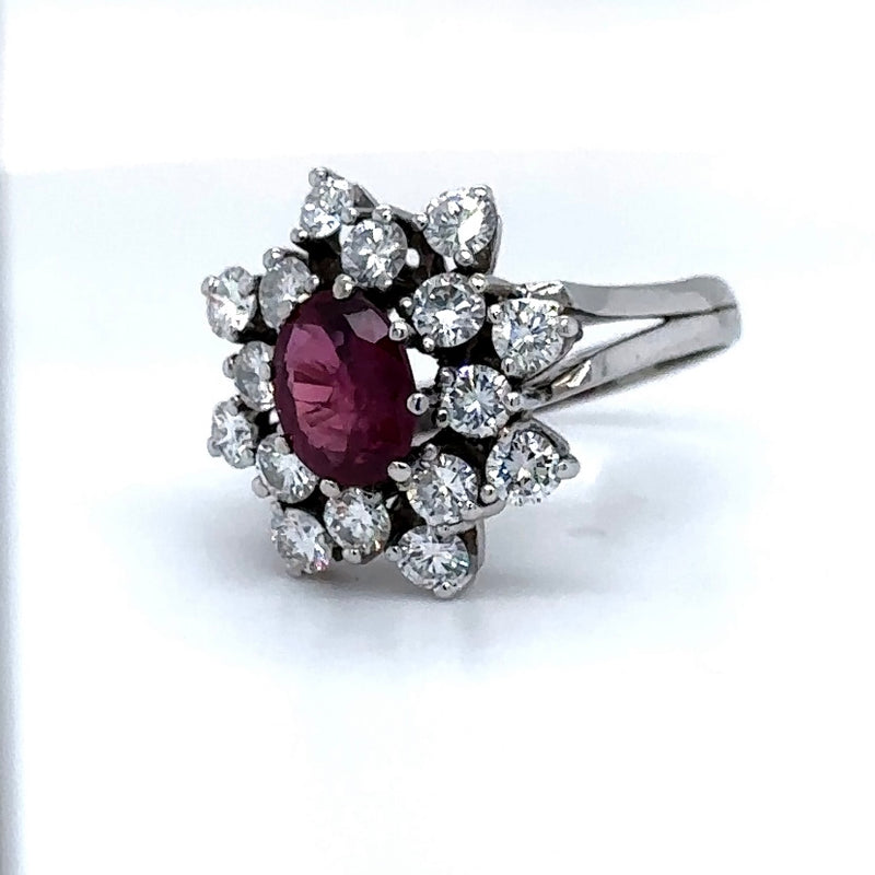 Timeless cocktail ring in 14 carat white gold with large rubies and fine brilliant-cut diamonds