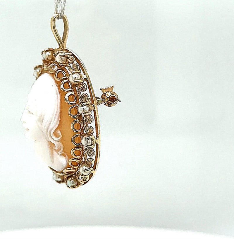 Antique brooch in 14 carat yellow gold with a beautiful shell gem