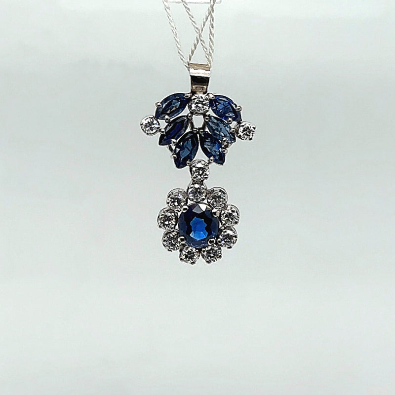 Decorative vintage pendant in 18 carat white gold with very fine sapphires and brilliant-cut diamonds