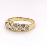 Yellow gold ring in 14 carat with unusual setting technology and 0.90ct. Diamonds 