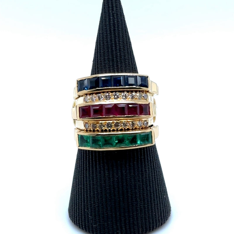 Elegant piece of jewelry consisting of 4 rings in 18 carat with diamonds, rubies, emeralds and sapphires 