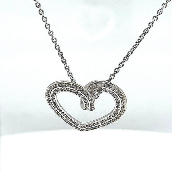 Elegant heart pendant with chain in 14 carat white gold with 148 fine brilliant-cut diamonds