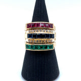 Elegant piece of jewelry consisting of 4 rings in 18 carat with diamonds, rubies, emeralds and sapphires 