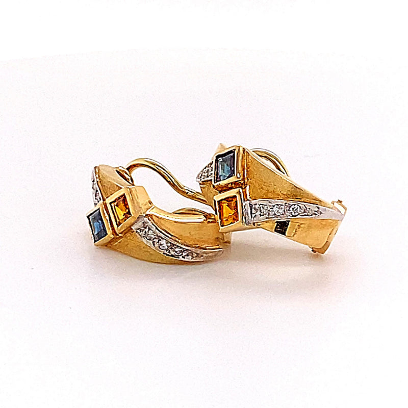 Elegante oorbellen van 14 karaat met briljant geslepen diamanten en oranje en blauwe saffieren