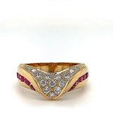 Edele geelgouden ring van 18 karaat met zeer fijne diamanten en robijnen