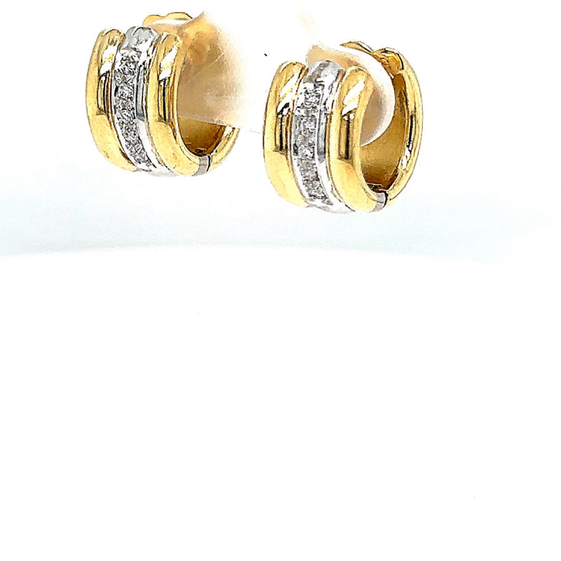 Elegante creolen in 18 karaat geel- en witgoud met diamanten 