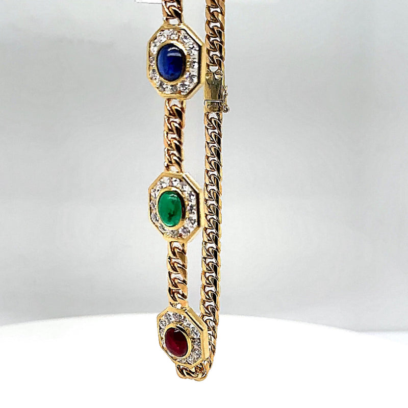 Elegante armband van 14 karaat geelgoud met edelstenen en diamanten 