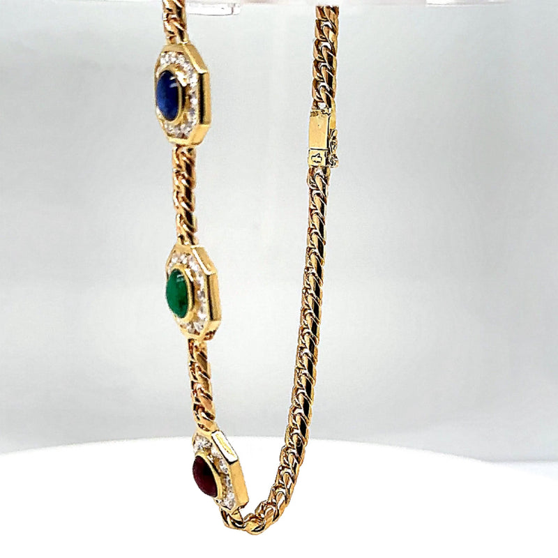 Elegant bracelet in 14 carat yellow gold with gemstones and diamonds 