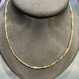 Elegant vintage necklace in 14 carat yellow and white gold 