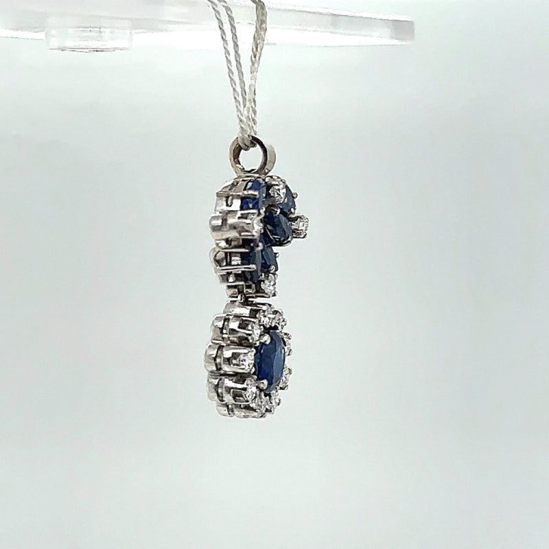 Decorative vintage pendant in 18 carat white gold with very fine sapphires and brilliant-cut diamonds