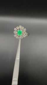 High-quality white gold ring in 18 carat with very fine diamonds and emerald - handmade