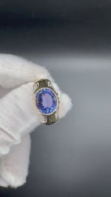 Stilvoller Ring in 14 Karat Gelbgold mit feinen Tansanit und Brillanten