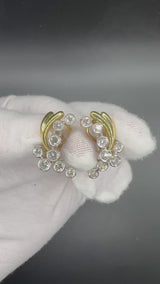 Ausgefallene bicolor Ohrringe in 18 Karat Gold mit feinen Brillanten