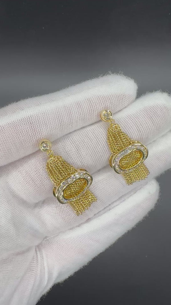 Außergewöhnliche Ohrringe in 18 Karat Gelbgold mit feinsten Brillanten