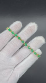 Steinbetontes Armband in 14 Karat Gelbgold mit Smaragden & Brillanten