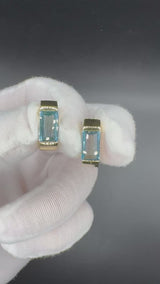 Elegante Ohrringe in 14 Karat Gelbgold mit leuchtenden Topasen