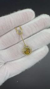 Besonderes Collier in 18 Karat Gelbgold mit gelben Tansanit & Brillanten