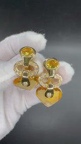 Wirkungsvolle Hängeohrringe in 18 Karat Gelbgold mit Brillanten, Citrin & Amethyst