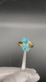 Besonderer Toi et Moi Ring in 18 Karat Gelbgold mit blauen Topas