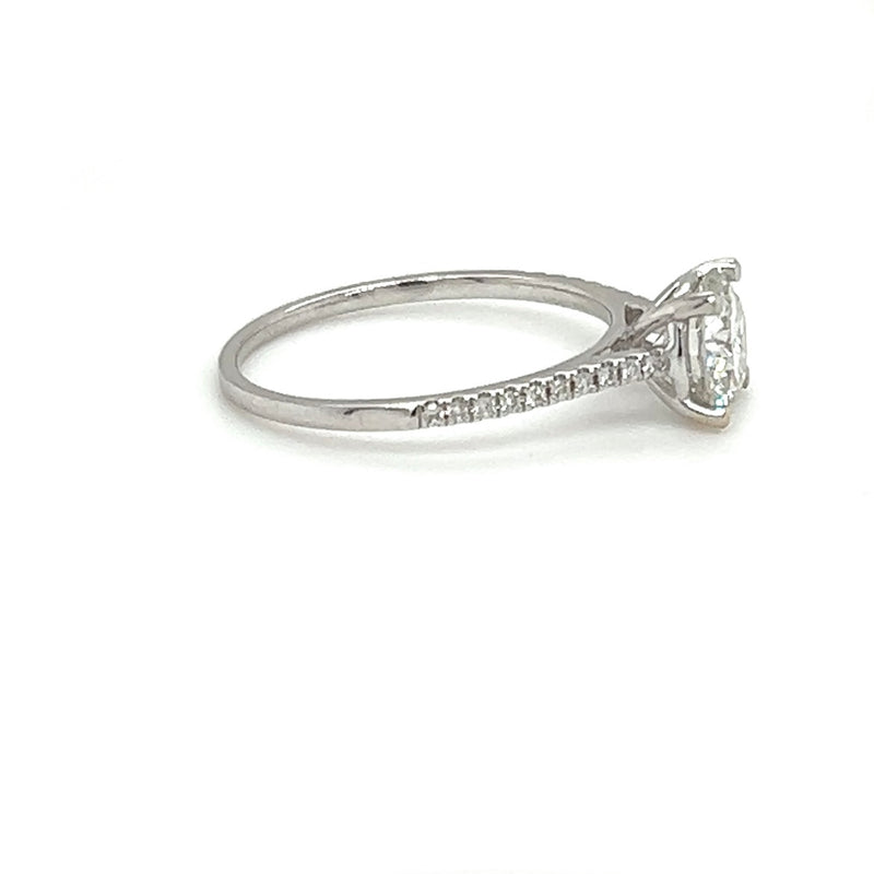 Solitaire ring in 18 carat (750/-.) white gold with one-carat brilliant cut diamond and pre-inserted ring