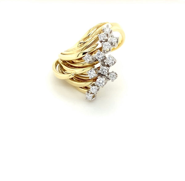 Unique vintage ring in 14 carat yellow and white gold with diamonds