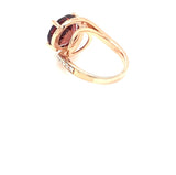 Roségold-Ring in 585/-. mit einem Turmalin und Brillanten