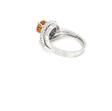ring in 750/-. white gold with a yellow sapphire and brilliant-cut diamonds