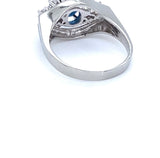Elegant 14 carat white gold ring with blue sapphire and brilliant-cut diamonds