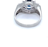 Elegant 14 carat white gold ring with blue sapphire and brilliant-cut diamonds