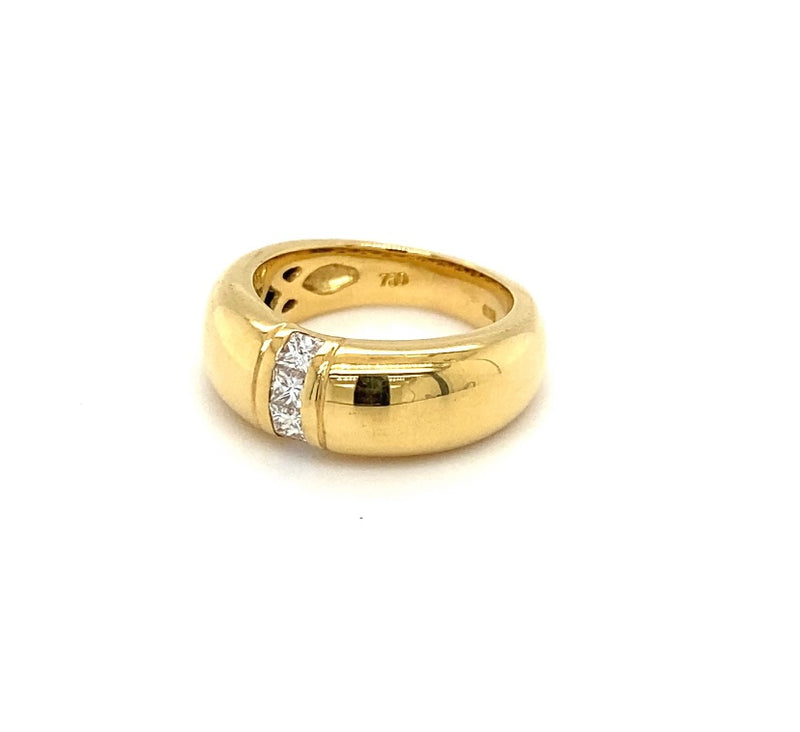 Massieve 18k geelgouden ring met prinsesgeslepen diamanten