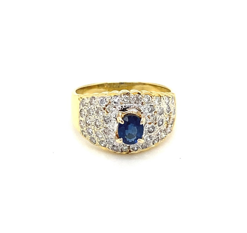 Bicolor ring van 18 karaat met briljant geslepen diamanten en blauwe saffier