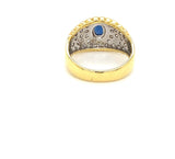 Bicolor Ring in 18 Karat mit Brillanten und blauen Saphir