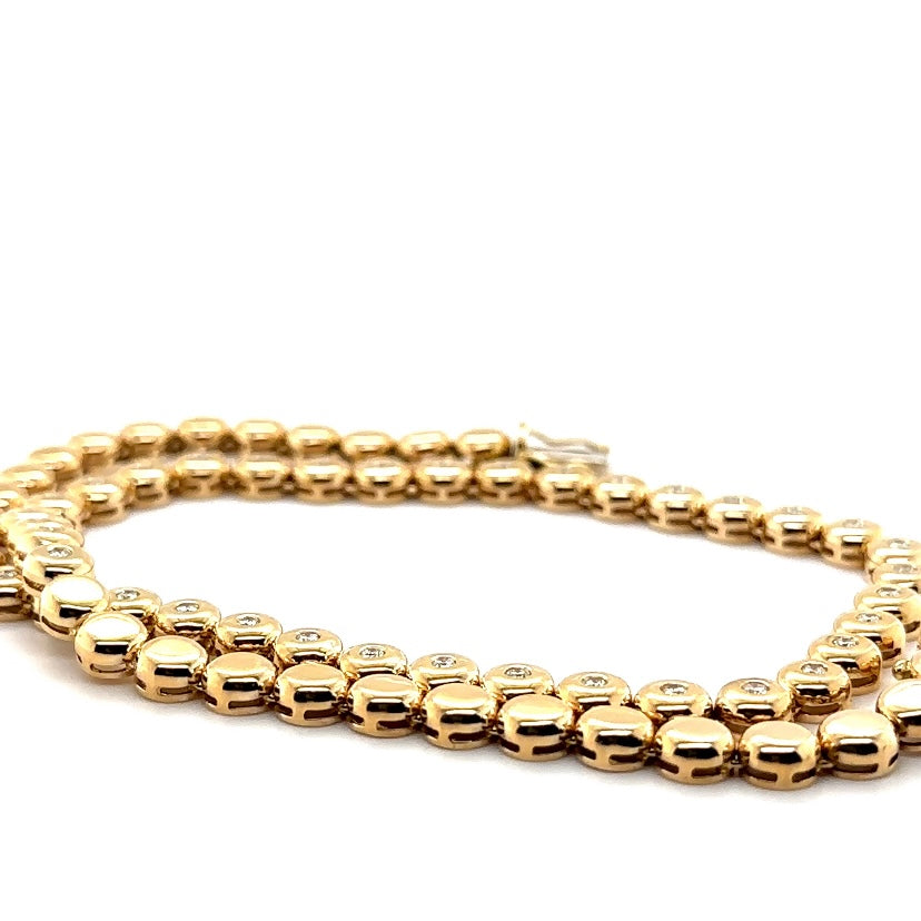Tijdloze ketting van 14 karaat geelgoud met briljant geslepen diamanten