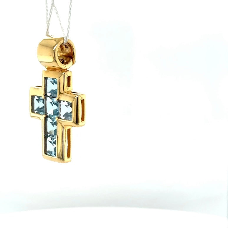 High-quality handmade cross pendant in 18 carat yellow gold with fine topazes