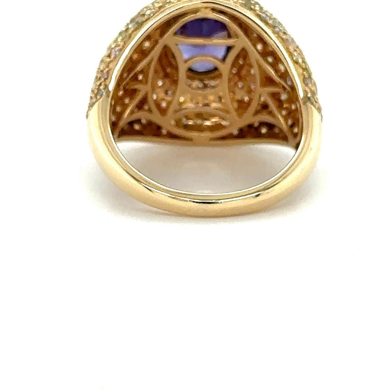 Magnificent yellow gold ring in 14 carat with over 200 brilliant-cut diamonds and very fine tanzanite