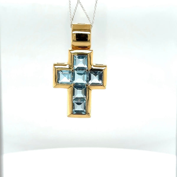 High-quality handmade cross pendant in 18 carat yellow gold with fine topazes