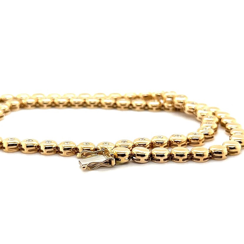 Tijdloze ketting van 14 karaat geelgoud met briljant geslepen diamanten