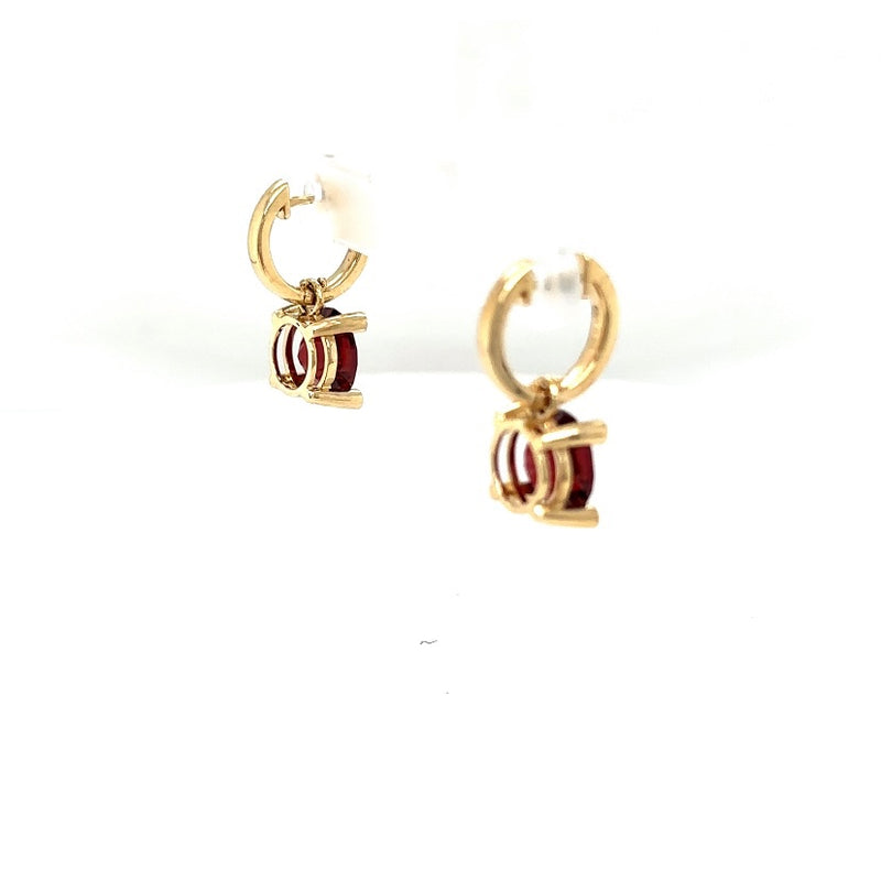 High-quality earrings in 14 carat yellow gold with garnet and diamonds