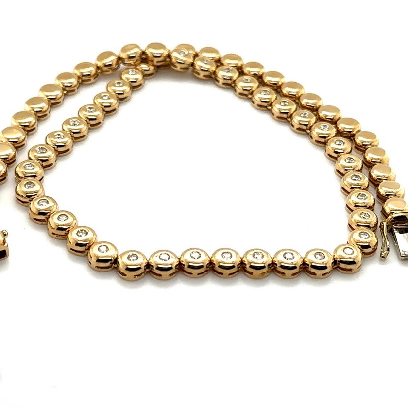 Tijdloze ketting van 14 karaat geelgoud met briljant geslepen diamanten