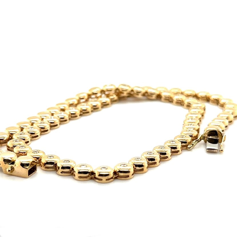 Tijdloze ketting van 14 karaat geelgoud met briljant geslepen diamanten