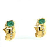 Elegant and high-quality creoles in 18 carats with very fine diamonds and emeralds