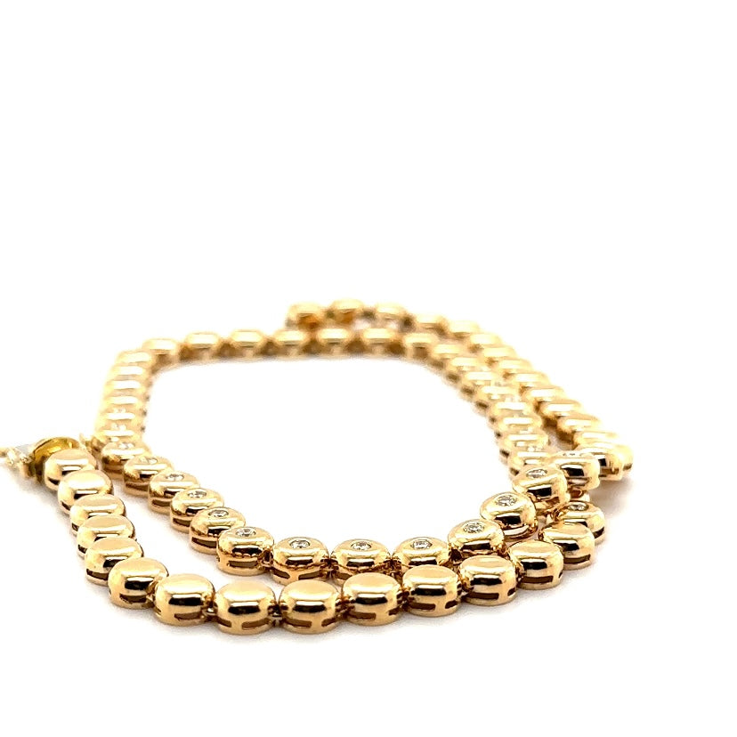 Tijdloze ketting van 14 karaat geelgoud met briljant geslepen diamanten